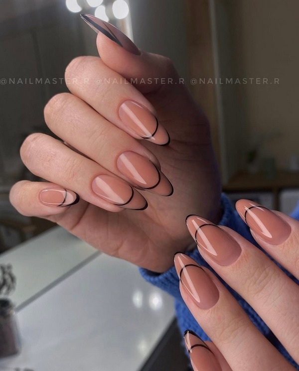 Double French manicure with clean design and contrasting lines Double French manicure is a stylish nail trend for 2026. A classic French tip is enhanced with a second line, creating a modern and elegant look. Perfect for those who love minimalism with a unique twist.